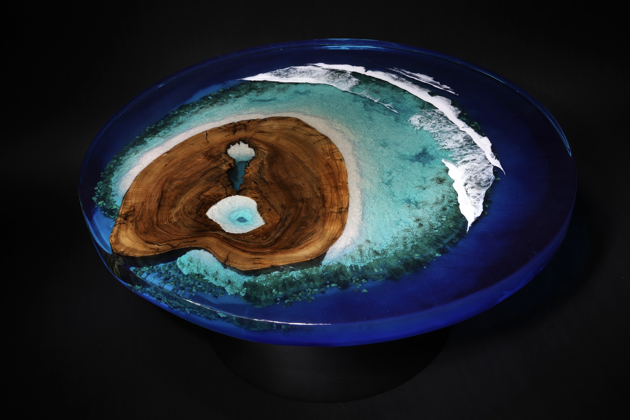 Tavarua - round table with hardwood island in deep blue pigmented epoxy
